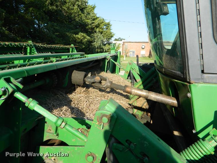 image for item DB1132 1985 John Deere 3830 self-propelled windrower