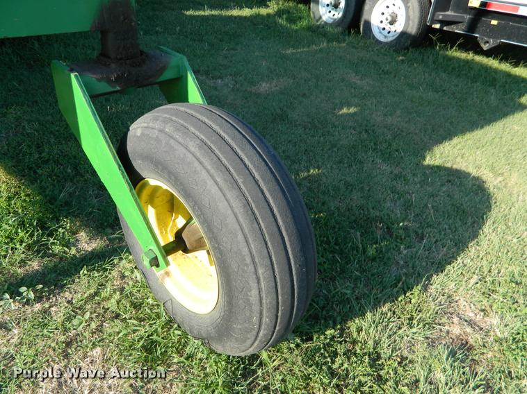 image for item DB1132 1985 John Deere 3830 self-propelled windrower