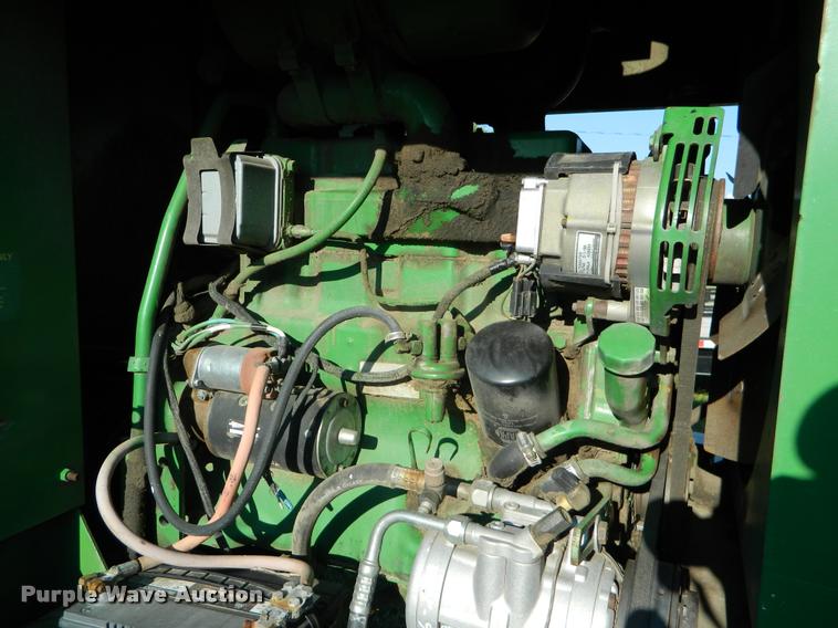 image for item DB1132 1985 John Deere 3830 self-propelled windrower
