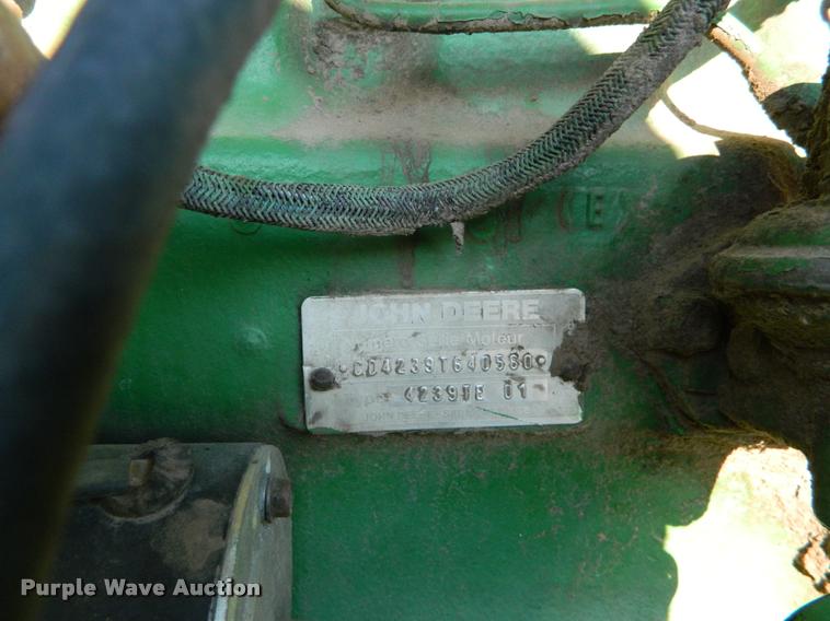 image for item DB1132 1985 John Deere 3830 self-propelled windrower