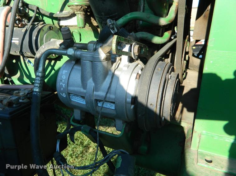 image for item DB1132 1985 John Deere 3830 self-propelled windrower