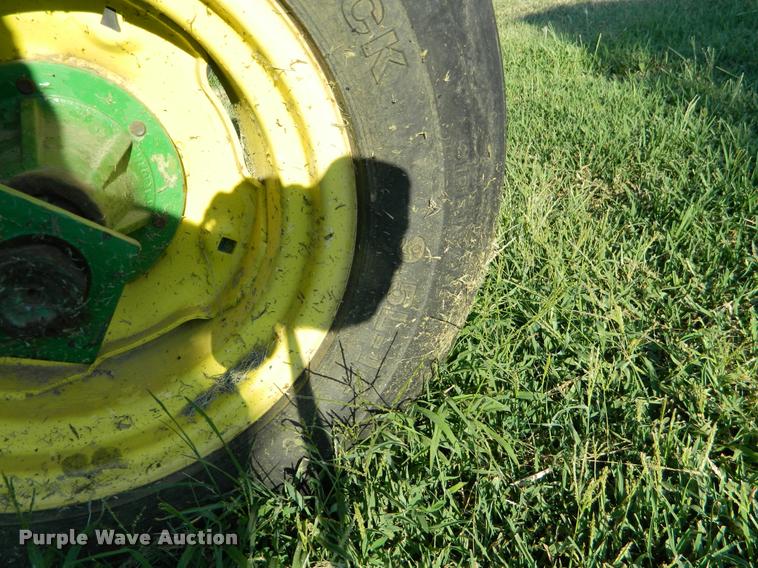 image for item DB1132 1985 John Deere 3830 self-propelled windrower