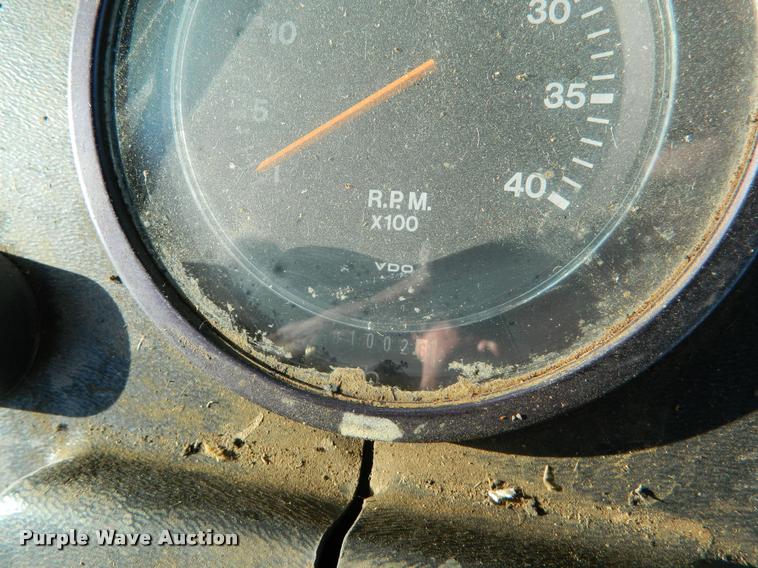 image for item DB1132 1985 John Deere 3830 self-propelled windrower