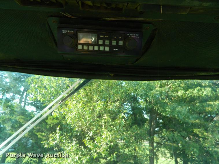 image for item DB1132 1985 John Deere 3830 self-propelled windrower