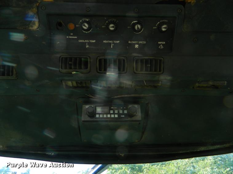 image for item DB1132 1985 John Deere 3830 self-propelled windrower