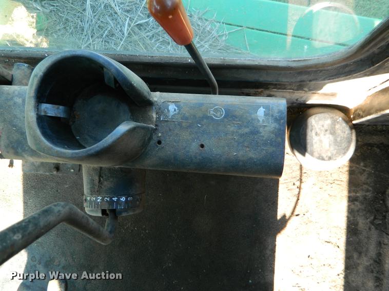 image for item DB1132 1985 John Deere 3830 self-propelled windrower