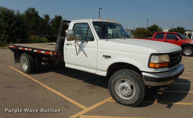 image for item DD0840 1994 Ford F450 Super Duty XL flatbed truck
