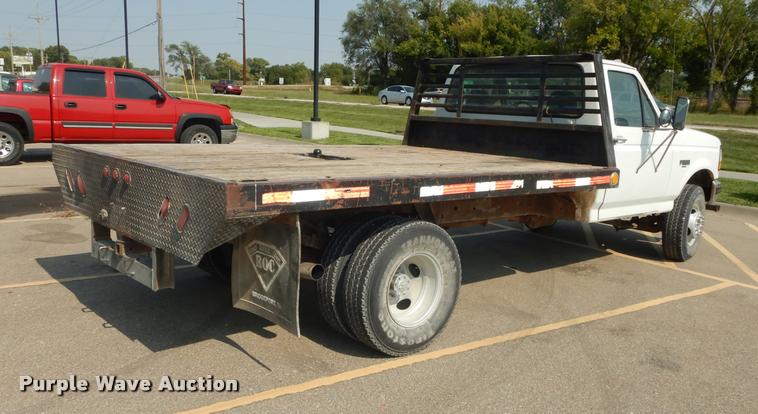 image for item DD0840 1994 Ford F450 Super Duty XL flatbed truck