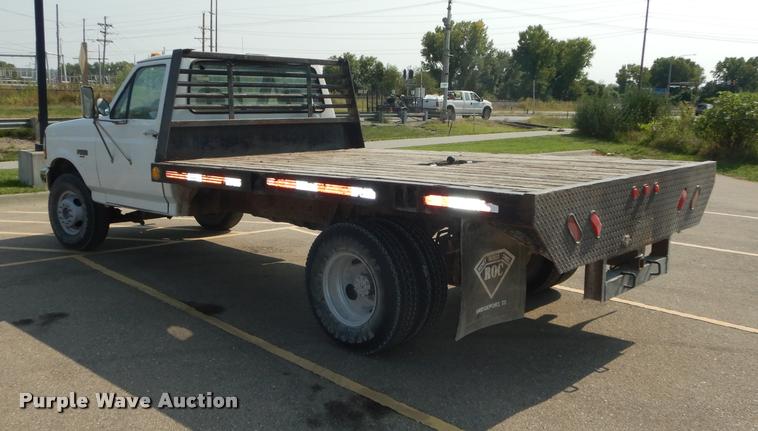 image for item DD0840 1994 Ford F450 Super Duty XL flatbed truck