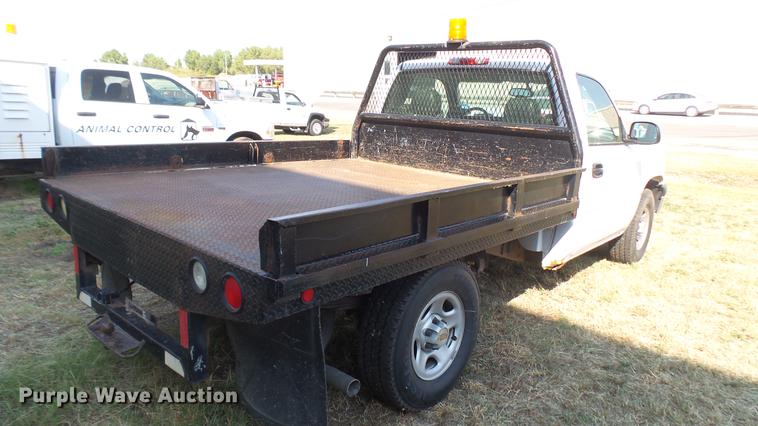 image for item DC1758 2004 Chevrolet Silverado 1500 flatbed pickup truck