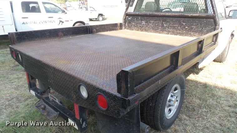 image for item DC1758 2004 Chevrolet Silverado 1500 flatbed pickup truck