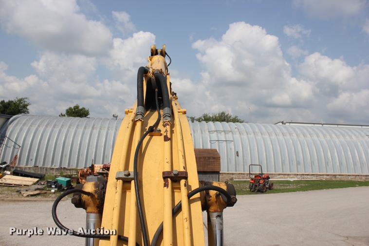 image for item L3207 2000 John Deere 120 excavator