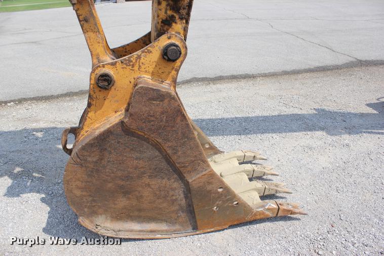 image for item L3207 2000 John Deere 120 excavator