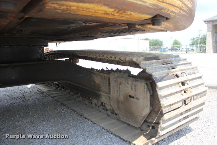 image for item L3207 2000 John Deere 120 excavator