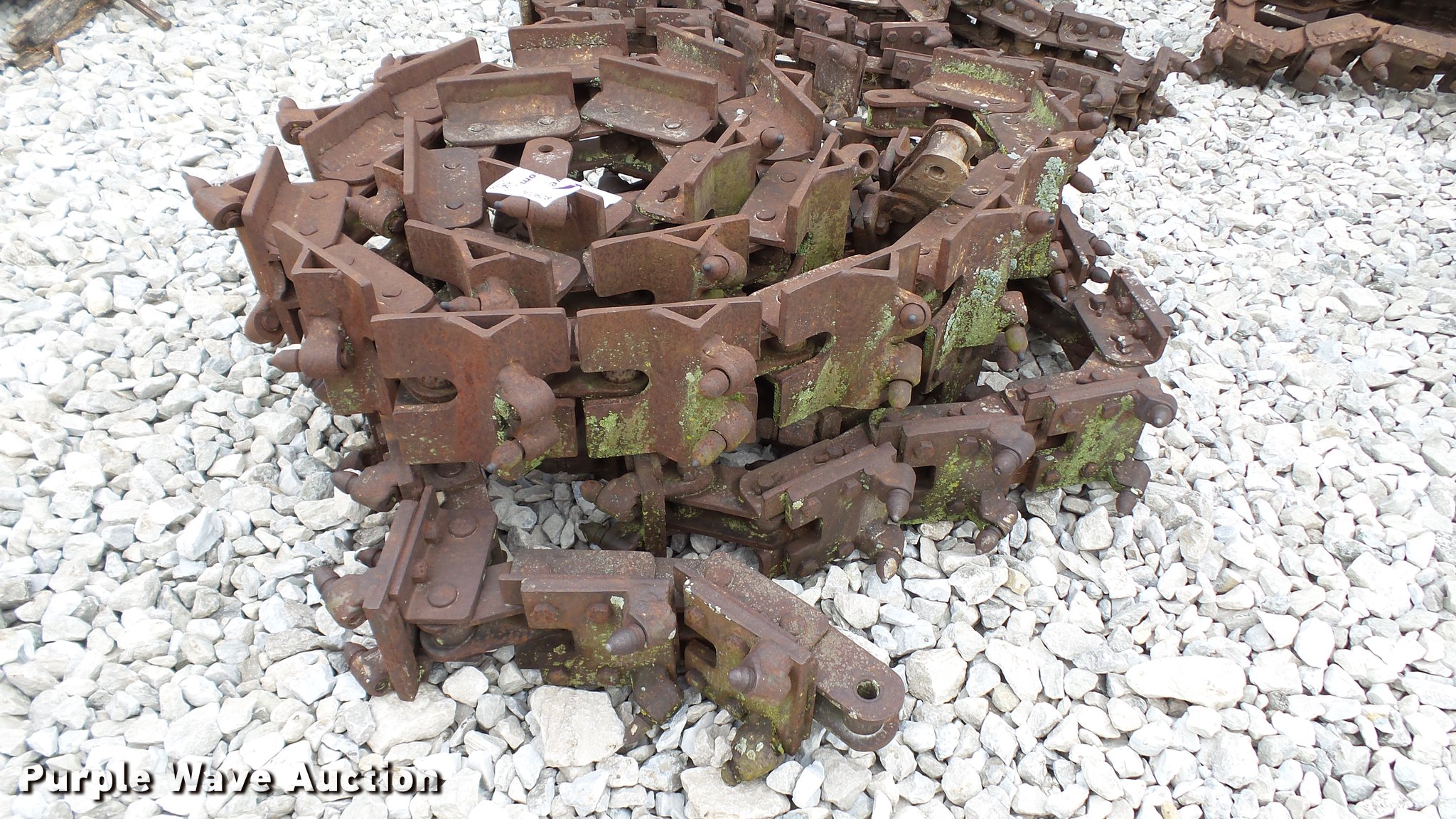 (2) trencher rock chains in Beardstown, IL Item DC2628 sold Purple Wave