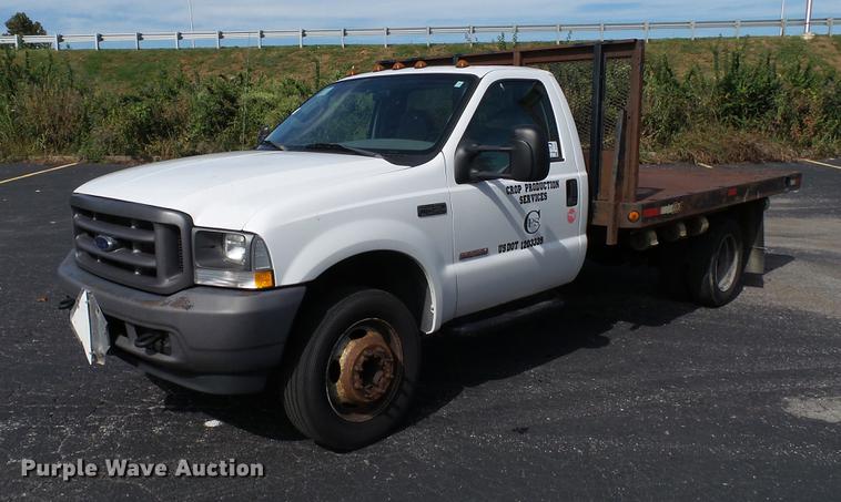 image for item DC2570 2004 Ford F450 Super Duty flatbed pickup truck