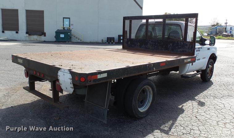 image for item DC2570 2004 Ford F450 Super Duty flatbed pickup truck