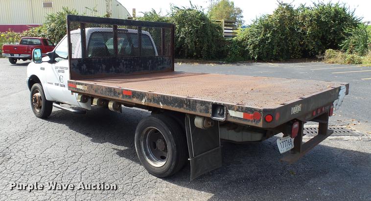image for item DC2570 2004 Ford F450 Super Duty flatbed pickup truck