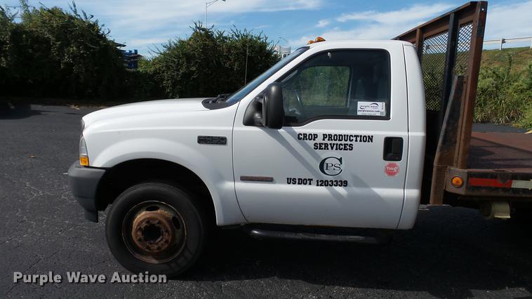image for item DC2570 2004 Ford F450 Super Duty flatbed pickup truck