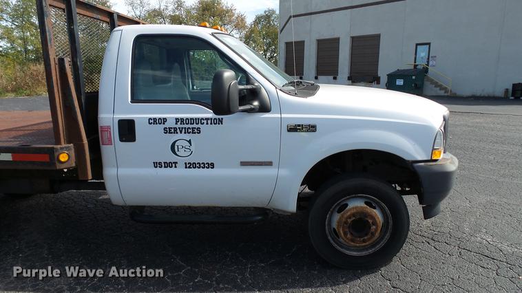 image for item DC2570 2004 Ford F450 Super Duty flatbed pickup truck