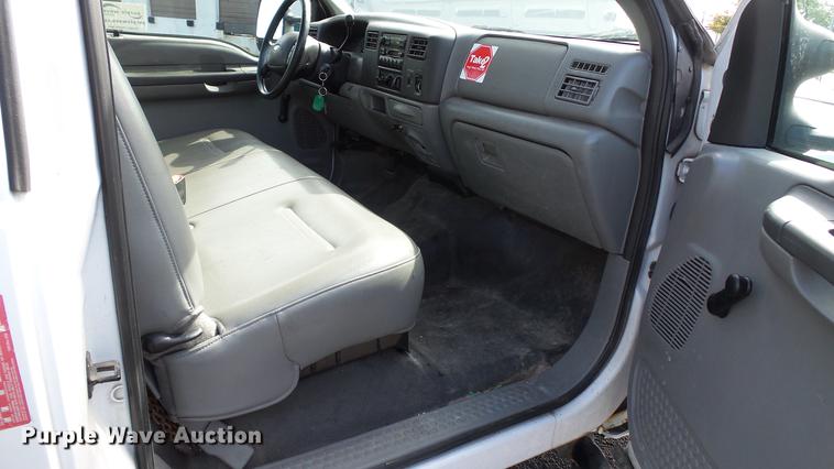 image for item DC2570 2004 Ford F450 Super Duty flatbed pickup truck