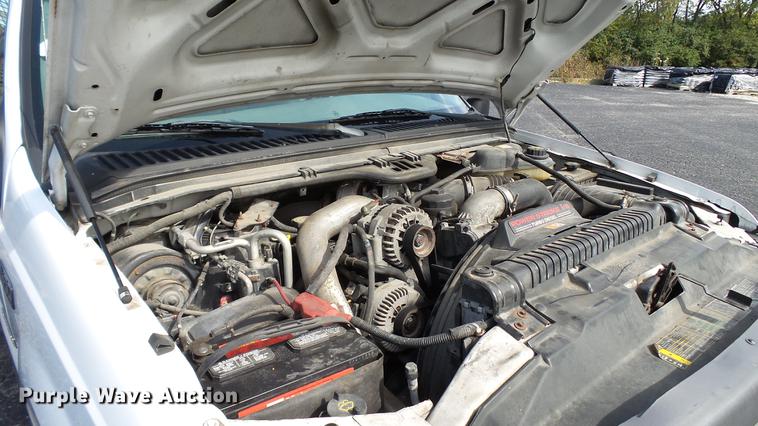 image for item DC2570 2004 Ford F450 Super Duty flatbed pickup truck