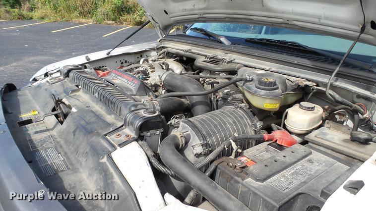 image for item DC2570 2004 Ford F450 Super Duty flatbed pickup truck