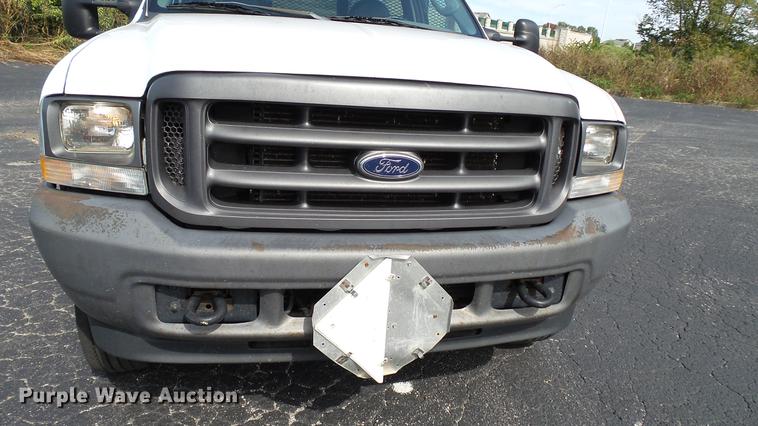 image for item DC2570 2004 Ford F450 Super Duty flatbed pickup truck