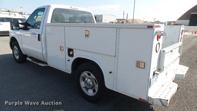 image for item DC1772 2011 Ford F250 Super Duty utility bed pickup truck