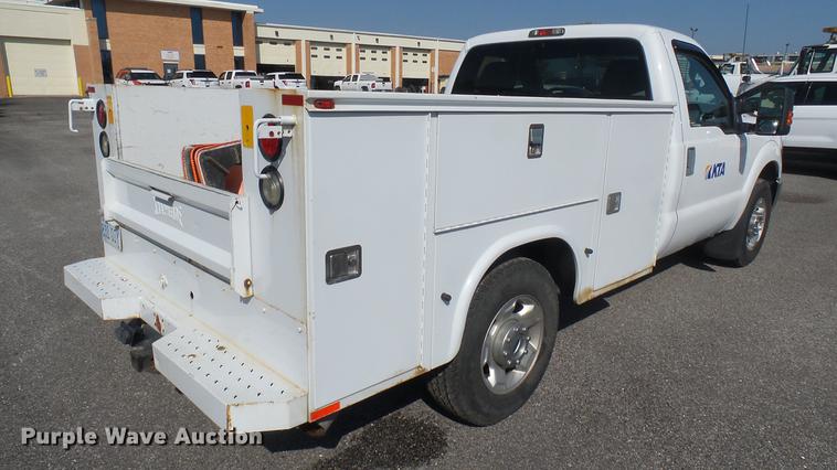 image for item DC1773 2011 Ford F250 Super Duty utility bed pickup truck