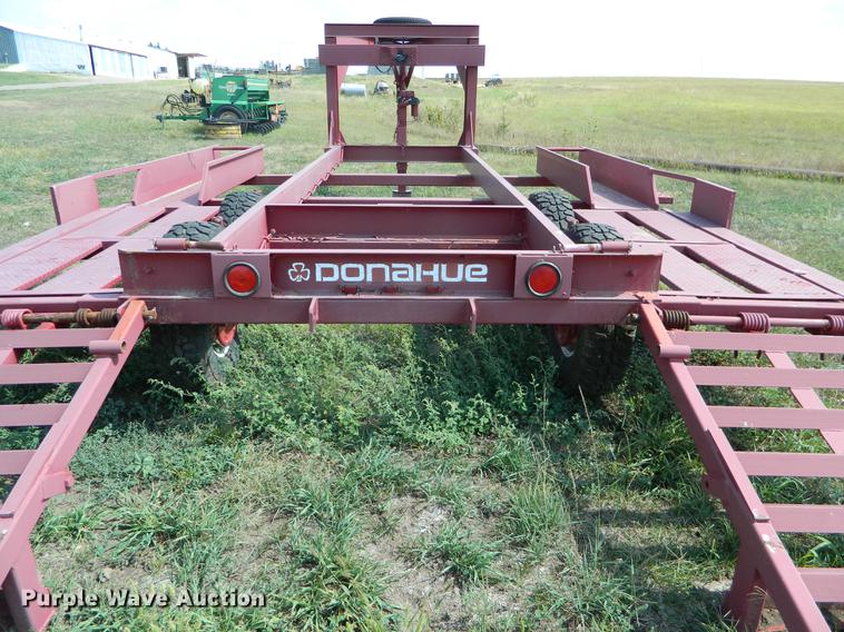 image for item DB1136 1993 Donahue EXG-160 swather trailer
