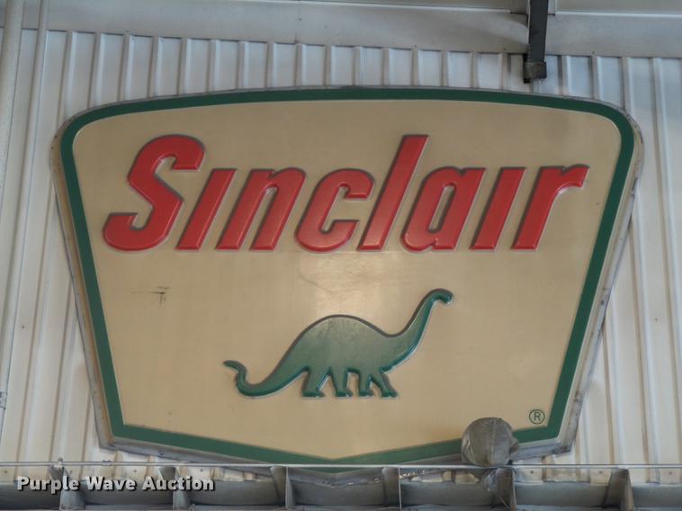 (2) Sinclair signs in Liberty, MO Item DD2153 sold Purple Wave