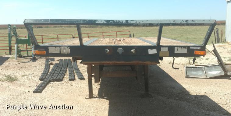 image for item DI9869 1999 Transcraft DTL2000 Super-Beam drop deck trailer