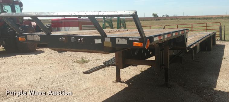 image for item DI9869 1999 Transcraft DTL2000 Super-Beam drop deck trailer