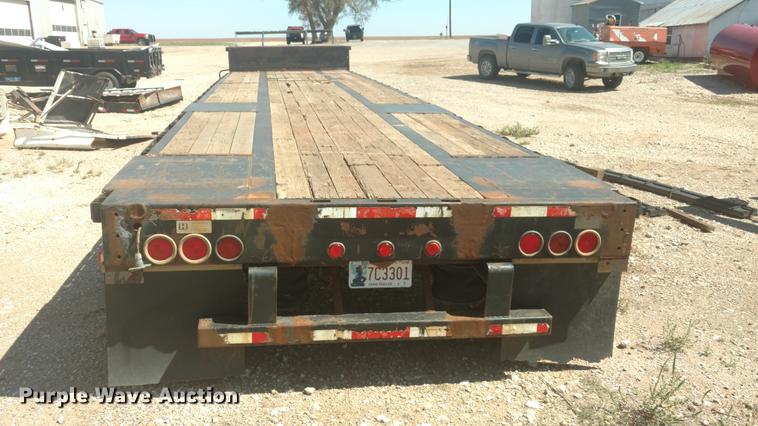 image for item DI9869 1999 Transcraft DTL2000 Super-Beam drop deck trailer