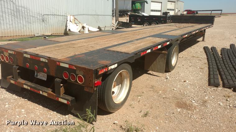 image for item DI9869 1999 Transcraft DTL2000 Super-Beam drop deck trailer