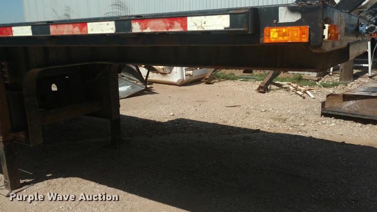 image for item DI9869 1999 Transcraft DTL2000 Super-Beam drop deck trailer