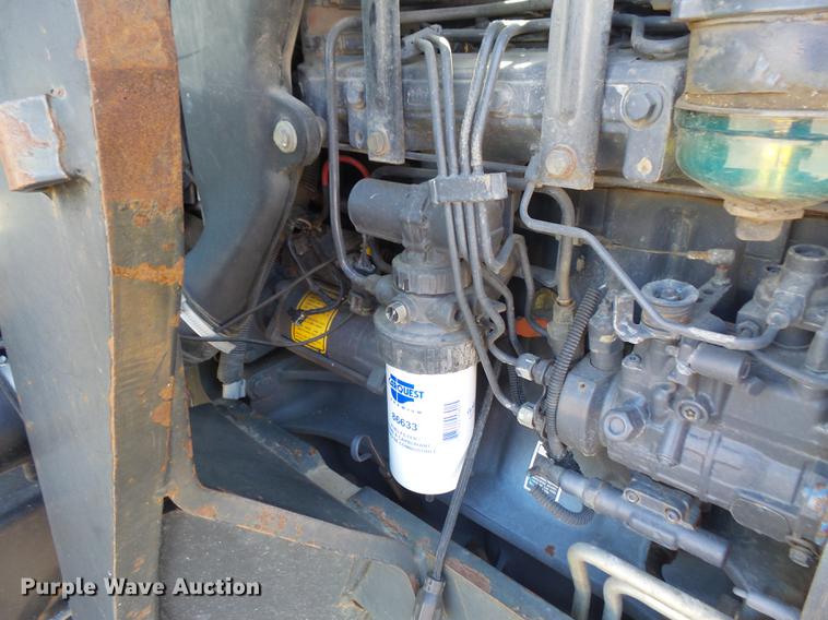 image for item DD0781 2002 New Holland TS100 tractor