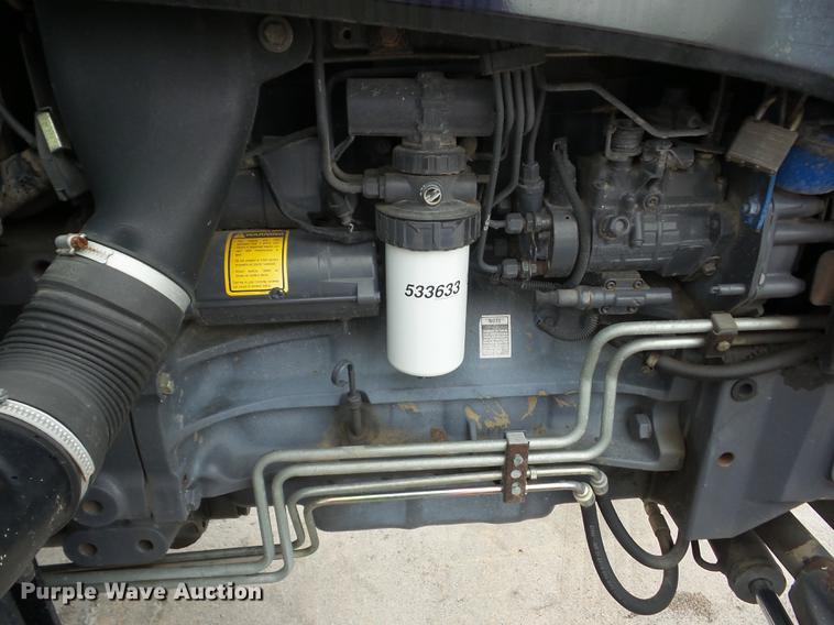 image for item K6387 2002 New Holland TS100 tractor