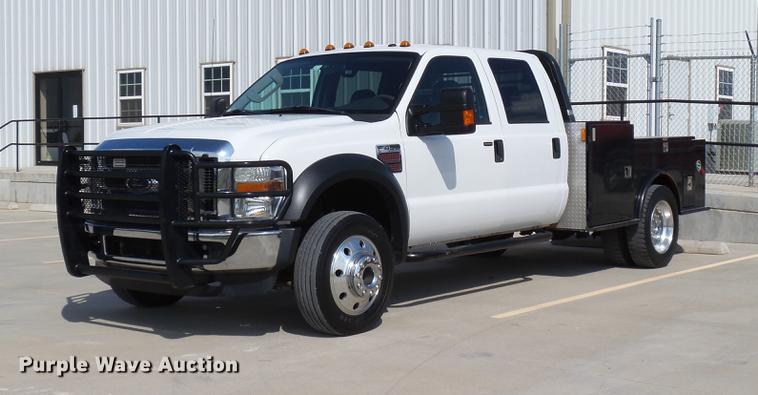 image for item DB4201 2009 Ford F450 Super Duty XLT Crew Cab flatbed truck