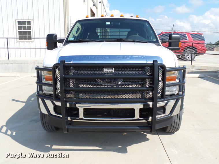 image for item DB4201 2009 Ford F450 Super Duty XLT Crew Cab flatbed truck