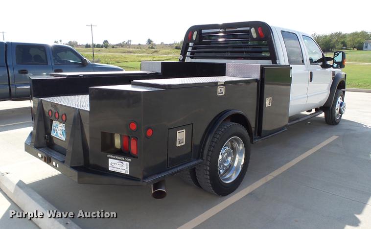 image for item DB4201 2009 Ford F450 Super Duty XLT Crew Cab flatbed truck