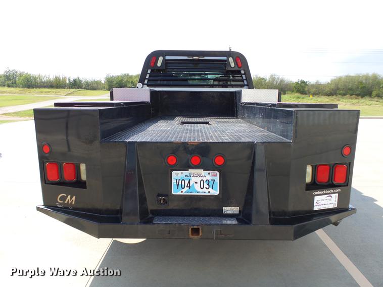 image for item DB4201 2009 Ford F450 Super Duty XLT Crew Cab flatbed truck