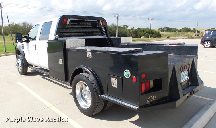 image for item DB4201 2009 Ford F450 Super Duty XLT Crew Cab flatbed truck