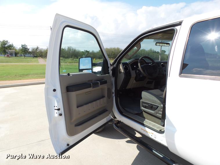 image for item DB4201 2009 Ford F450 Super Duty XLT Crew Cab flatbed truck