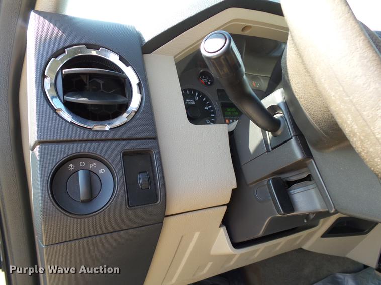 image for item DB4201 2009 Ford F450 Super Duty XLT Crew Cab flatbed truck