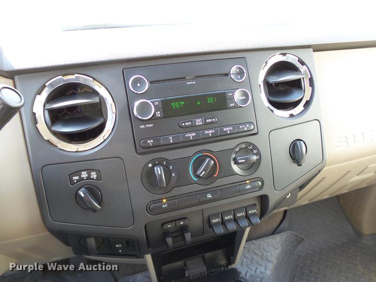 image for item DB4201 2009 Ford F450 Super Duty XLT Crew Cab flatbed truck