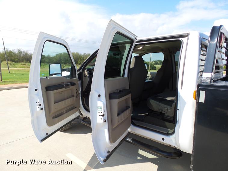 image for item DB4201 2009 Ford F450 Super Duty XLT Crew Cab flatbed truck