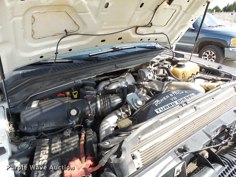 image for item DB4201 2009 Ford F450 Super Duty XLT Crew Cab flatbed truck