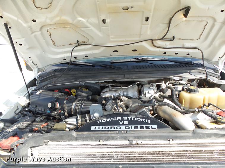 image for item DB4201 2009 Ford F450 Super Duty XLT Crew Cab flatbed truck